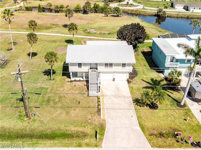 drone / aerial view with a water view