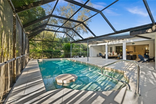 145 Forestwood Dr, Naples, FL 34110 - swimming pool with outdoor lounge area, a patio area, and a lanai