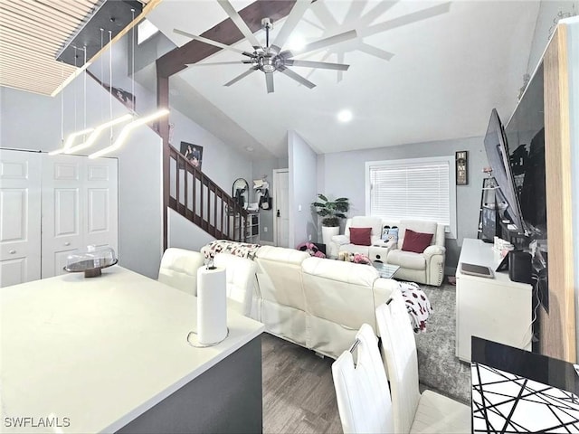 5529/5531 10th Ave, Fort Myers, FL 33907 - living area with lofted ceiling, ceiling fan, wood finished floors, and stairway