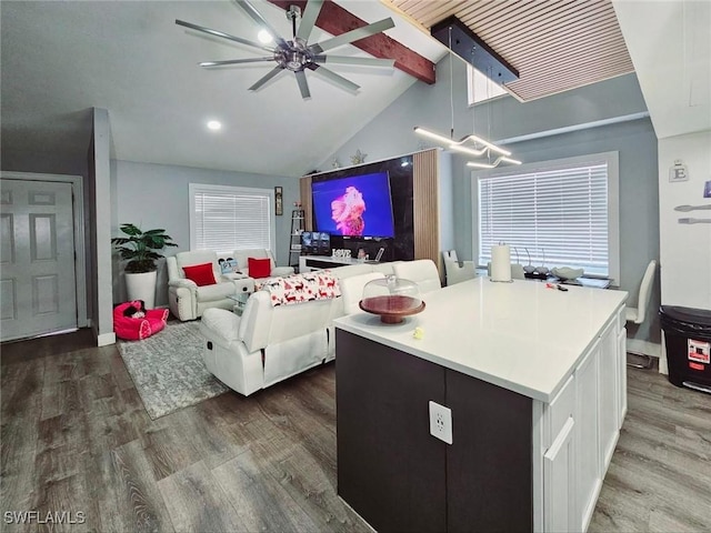 5529/5531 10th Ave, Fort Myers, FL 33907 - living room with wood finished floors, a ceiling fan, beam ceiling, and high vaulted ceiling