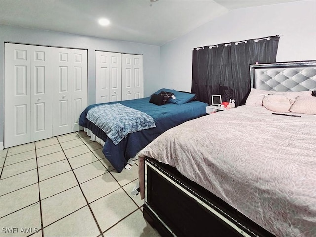5529/5531 10th Ave, Fort Myers, FL 33907 - bedroom featuring light tile patterned floors, multiple closets, lofted ceiling, and recessed lighting