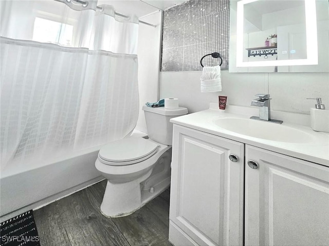 5529/5531 10th Ave, Fort Myers, FL 33907 - full bathroom featuring vanity, shower / tub combo, toilet, and wood finished floors