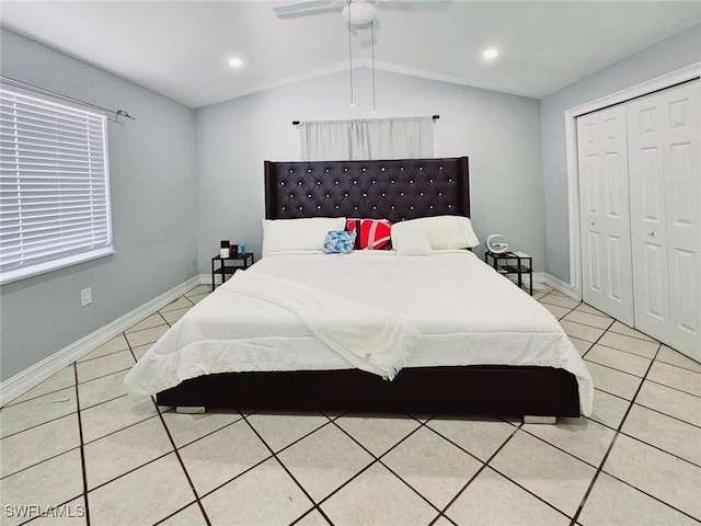 5529/5531 10th Ave, Fort Myers, FL 33907 - bedroom featuring light tile patterned floors, vaulted ceiling, a closet, ceiling fan, and baseboards