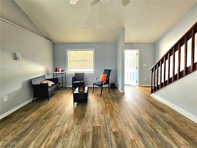 5529/5531 10th Ave, Fort Myers, FL 33907 - living area featuring wood finished floors, stairs, ceiling fan, baseboards, and vaulted ceiling