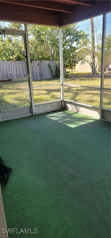 unfurnished sunroom with a healthy amount of sunlight