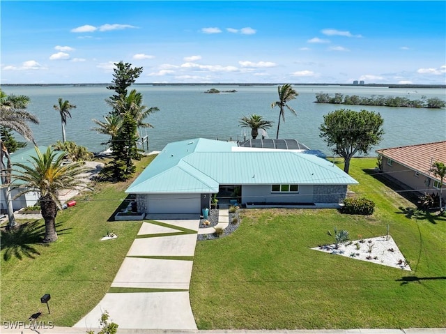 birds eye view of property featuring a water view