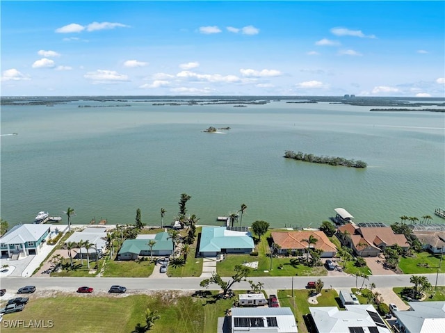 aerial view featuring a residential view and a water view