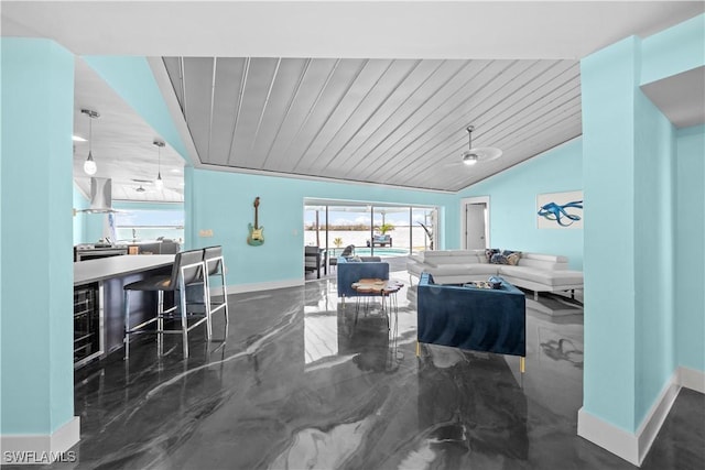 living room with wood ceiling, marble finish floor, baseboards, and lofted ceiling