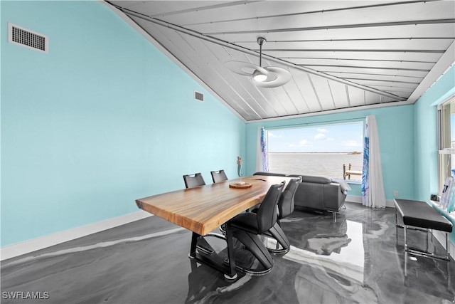 interior space featuring visible vents, lofted ceiling, and baseboards