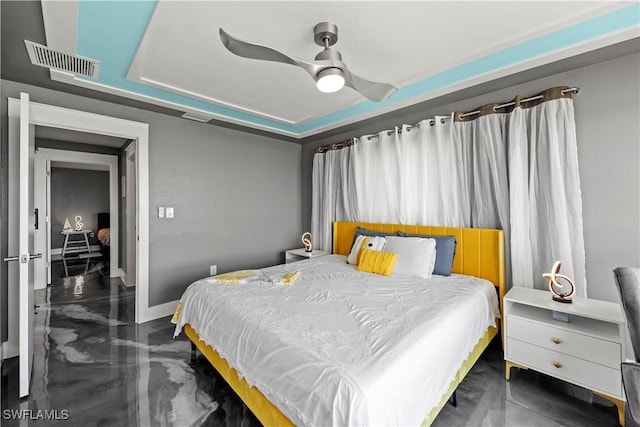 bedroom with visible vents, baseboards, and a ceiling fan