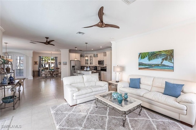 living room with visible vents, ceiling fan, ornamental molding, recessed lighting, and light tile patterned flooring