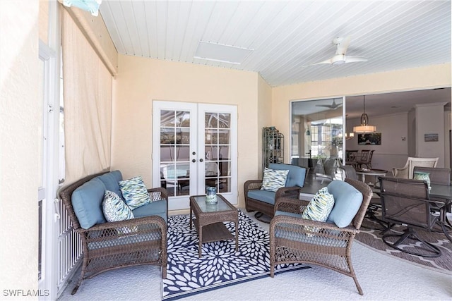 view of patio with outdoor lounge area, french doors, and a ceiling fan