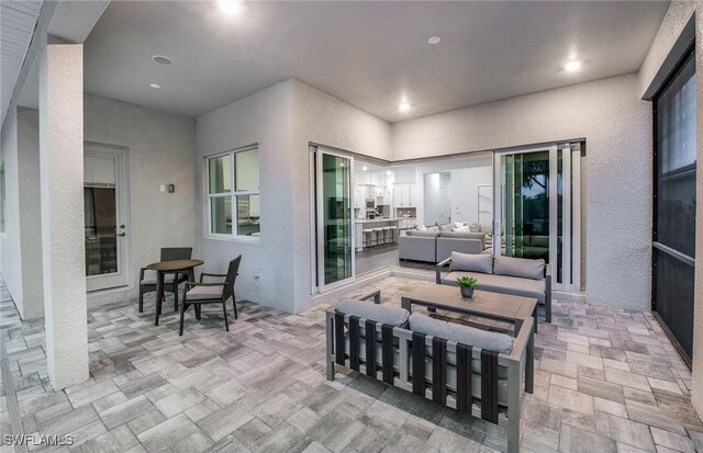 view of patio / terrace with an outdoor hangout area