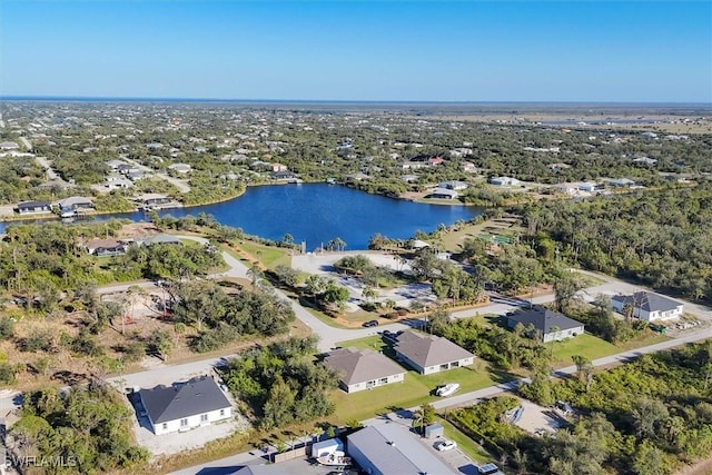 aerial view featuring a residential view and a water view