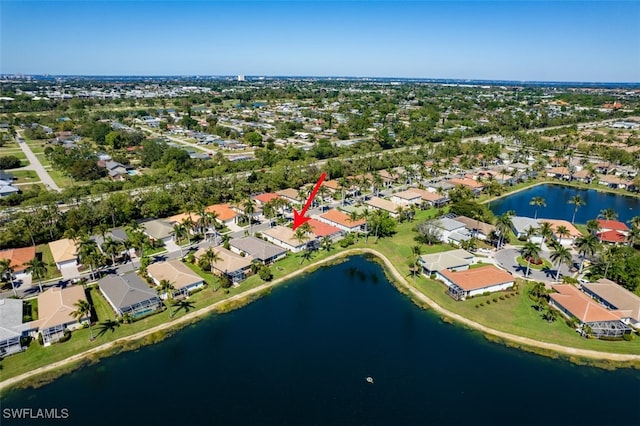 aerial view featuring a water view and a residential view