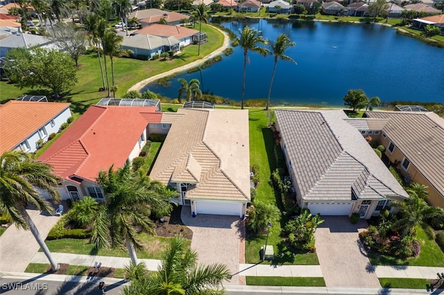 aerial view featuring a residential view and a water view