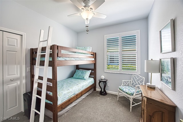 bedroom with carpet flooring, a ceiling fan, and baseboards