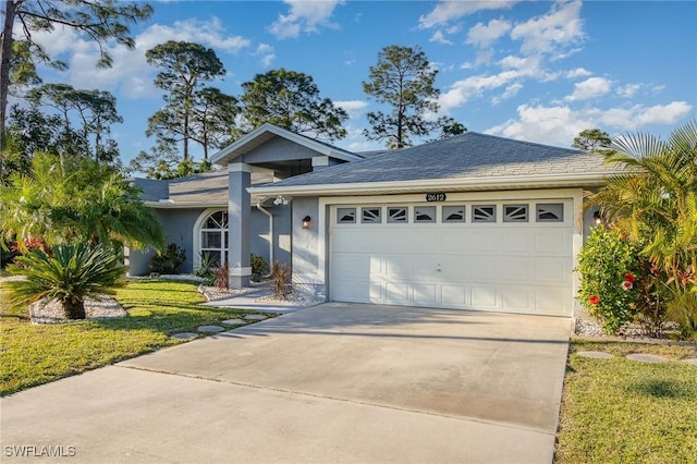 view of front of house featuring stucco siding, concrete driveway, a garage, and roof with shingles