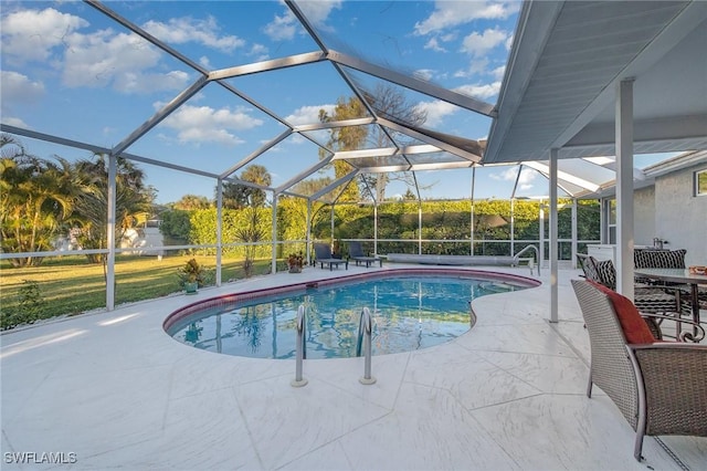 pool featuring glass enclosure and a patio