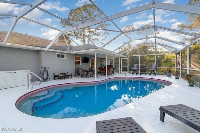 outdoor pool featuring a patio area