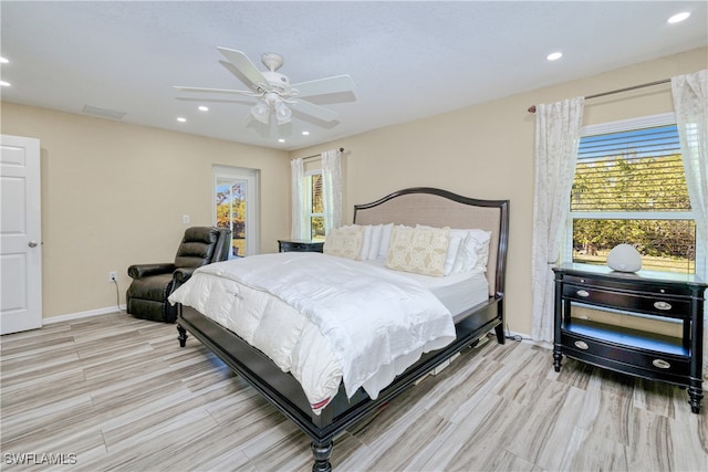 bedroom featuring recessed lighting, light wood-type flooring, baseboards, and a ceiling fan