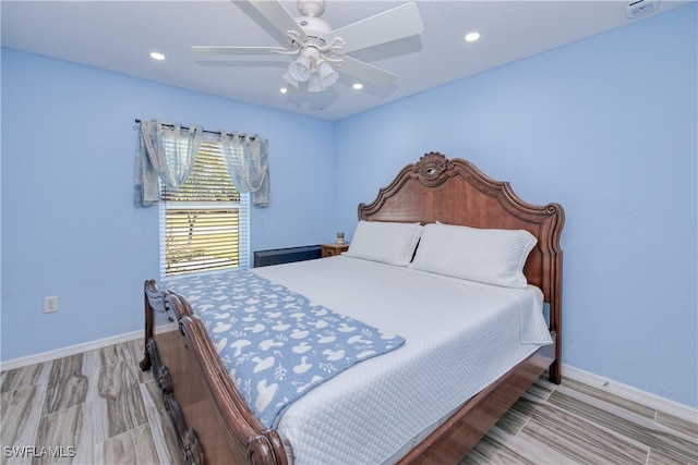 bedroom featuring recessed lighting, ceiling fan, and baseboards