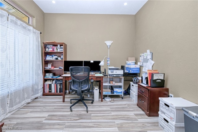 office area with wood finished floors