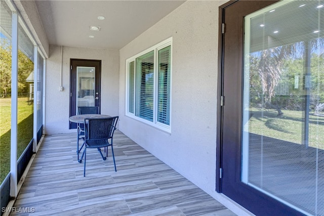 unfurnished sunroom featuring a healthy amount of sunlight