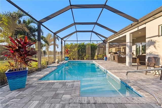 outdoor pool featuring a patio and a lanai