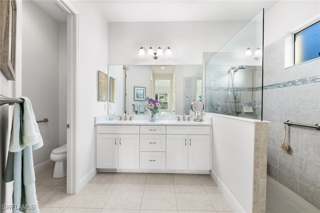 full bathroom with toilet, a walk in shower, a sink, tile patterned flooring, and double vanity