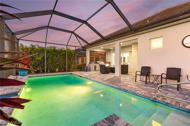 13589 Starwood Ln, Fort Myers, FL 33912 - pool at dusk with a patio, a ceiling fan, and an outdoor pool