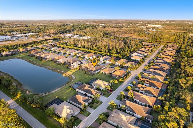 13589 Starwood Ln, Fort Myers, FL 33912 - aerial view featuring a residential view and a water view
