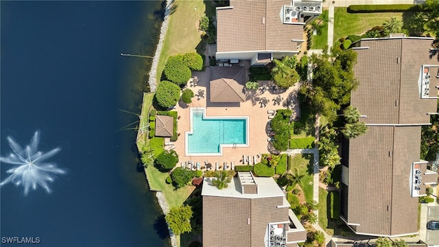 birds eye view of property with a water view