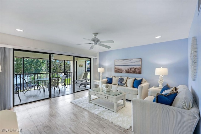 living area featuring recessed lighting and ceiling fan