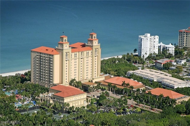 aerial view featuring a city view and a water view