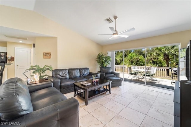 living room featuring light tile patterned flooring, visible vents, a ceiling fan, and vaulted ceiling