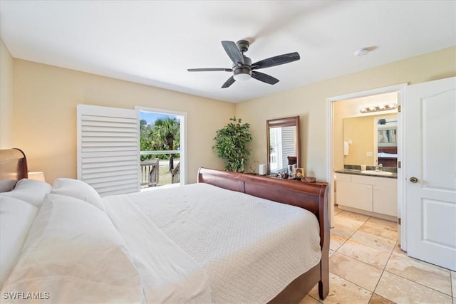 bedroom with light tile patterned flooring, ceiling fan, a sink, ensuite bathroom, and access to outside