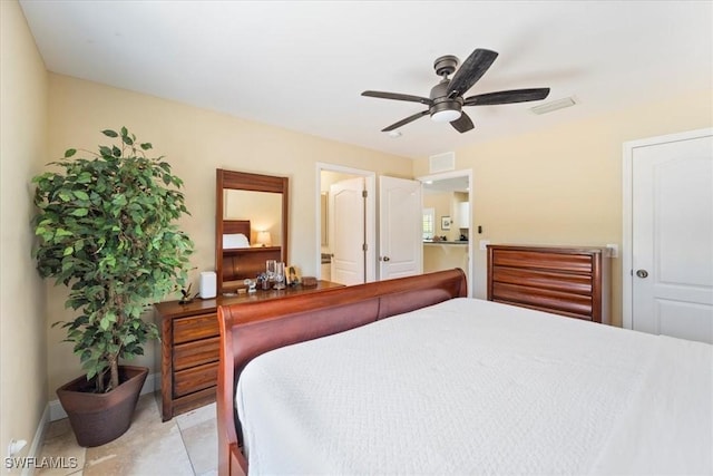 bedroom with visible vents, baseboards, ceiling fan, and light tile patterned flooring