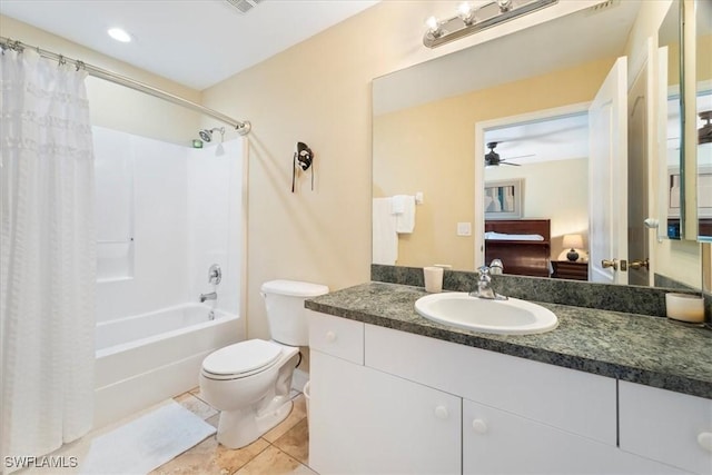 bathroom featuring vanity, ensuite bath, shower / bath combo, tile patterned flooring, and toilet