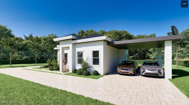 view of property exterior with a carport, decorative driveway, a yard, and stucco siding