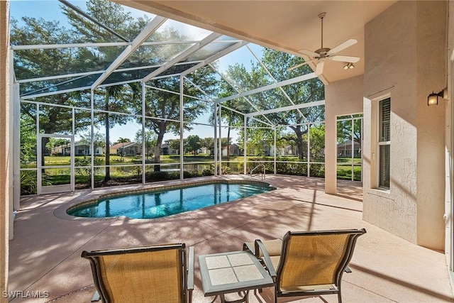 9011 Springview Loop, Estero, FL 33928 - outdoor pool featuring a patio, ceiling fan, and a lanai