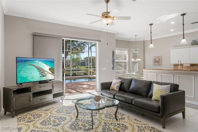 9011 Springview Loop, Estero, FL 33928 - living room featuring ornamental molding, ceiling fan, and light tile patterned floors