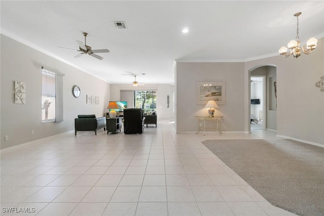 9011 Springview Loop, Estero, FL 33928 - living area with ornamental molding, ceiling fan, arched walkways, light tile patterned flooring, and baseboards