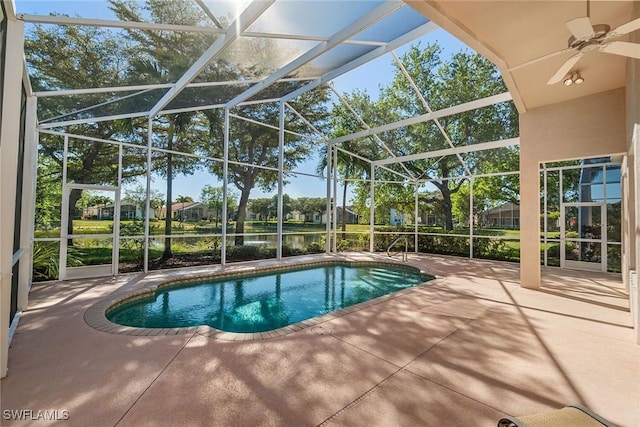 9011 Springview Loop, Estero, FL 33928 - swimming pool featuring a patio area, ceiling fan, and a lanai