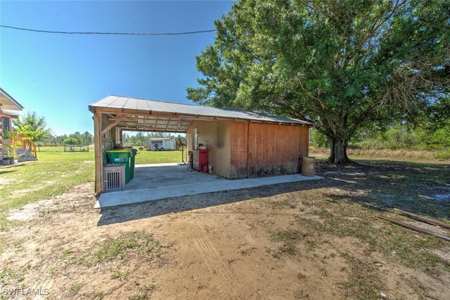 exterior space with an outbuilding