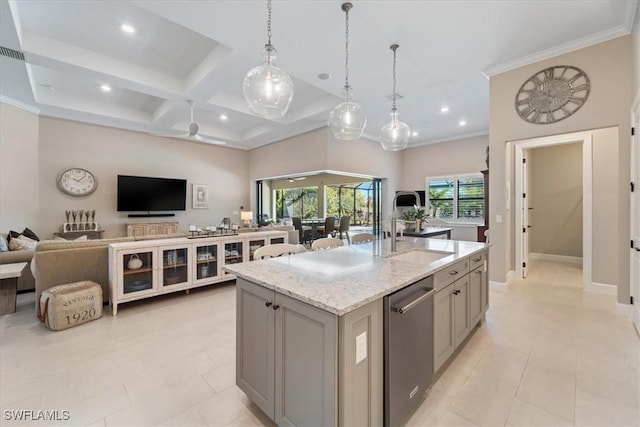 kitchen with a sink, gray cabinetry, open floor plan, coffered ceiling, and stainless steel dishwasher