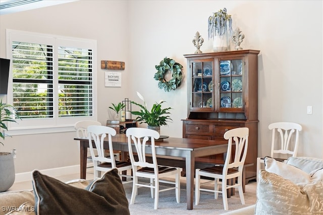 dining area featuring baseboards