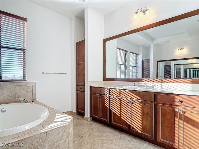 bathroom with a bath and vanity