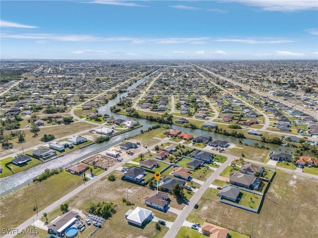 aerial view featuring a residential view and a water view