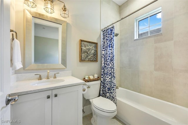 bathroom with vanity, shower / bath combination with curtain, and toilet